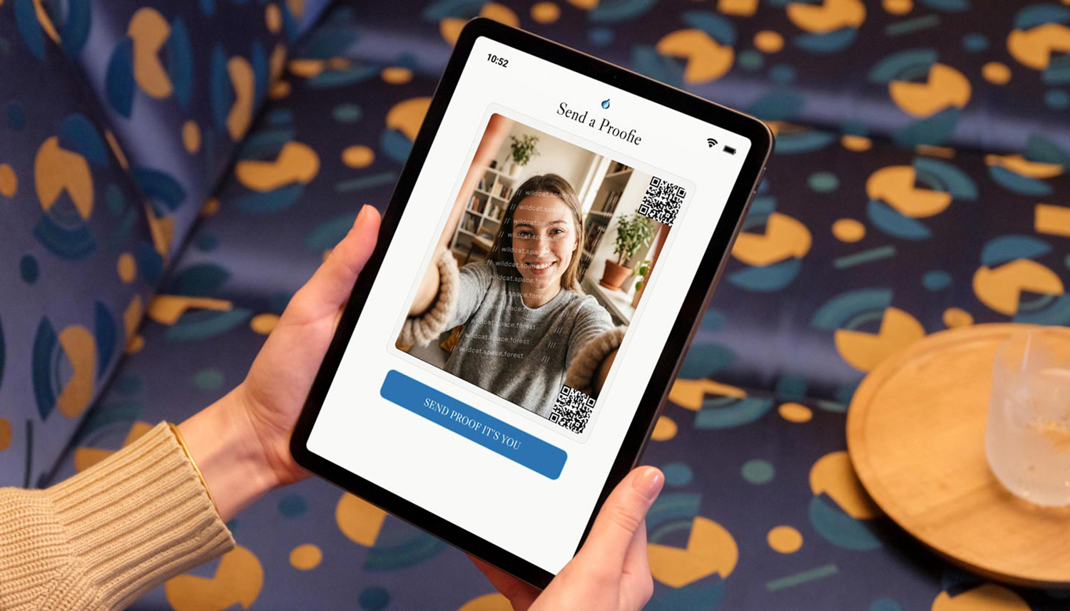 iPad showing the Trust Onion Send a Proofie screen with a verified selfie and QR code